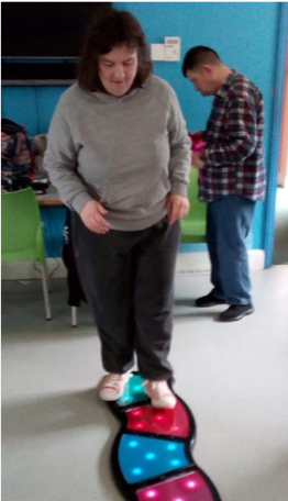 Fitzroy Maltings service user enjoying a musical instrument