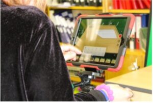photo showing the use of an iPad being used by a student